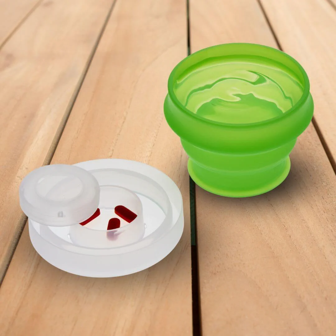 Gather Your Safe Travel Accessories like the Collapsible Cup and Pill Holder